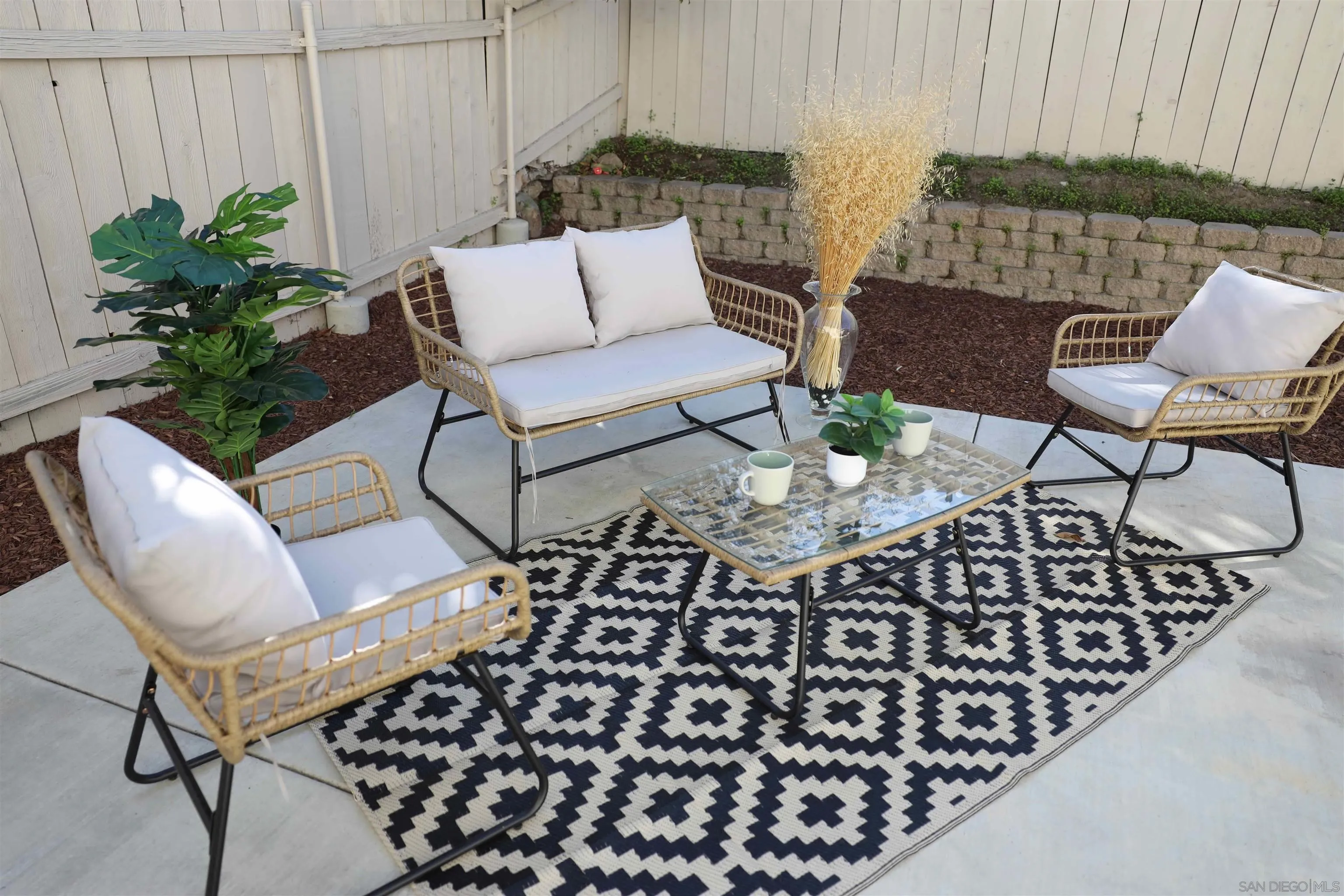 8907 Taurus Place San Diego, CA 92126 - Photo 33 of 40 a view of a chairs and table in patio