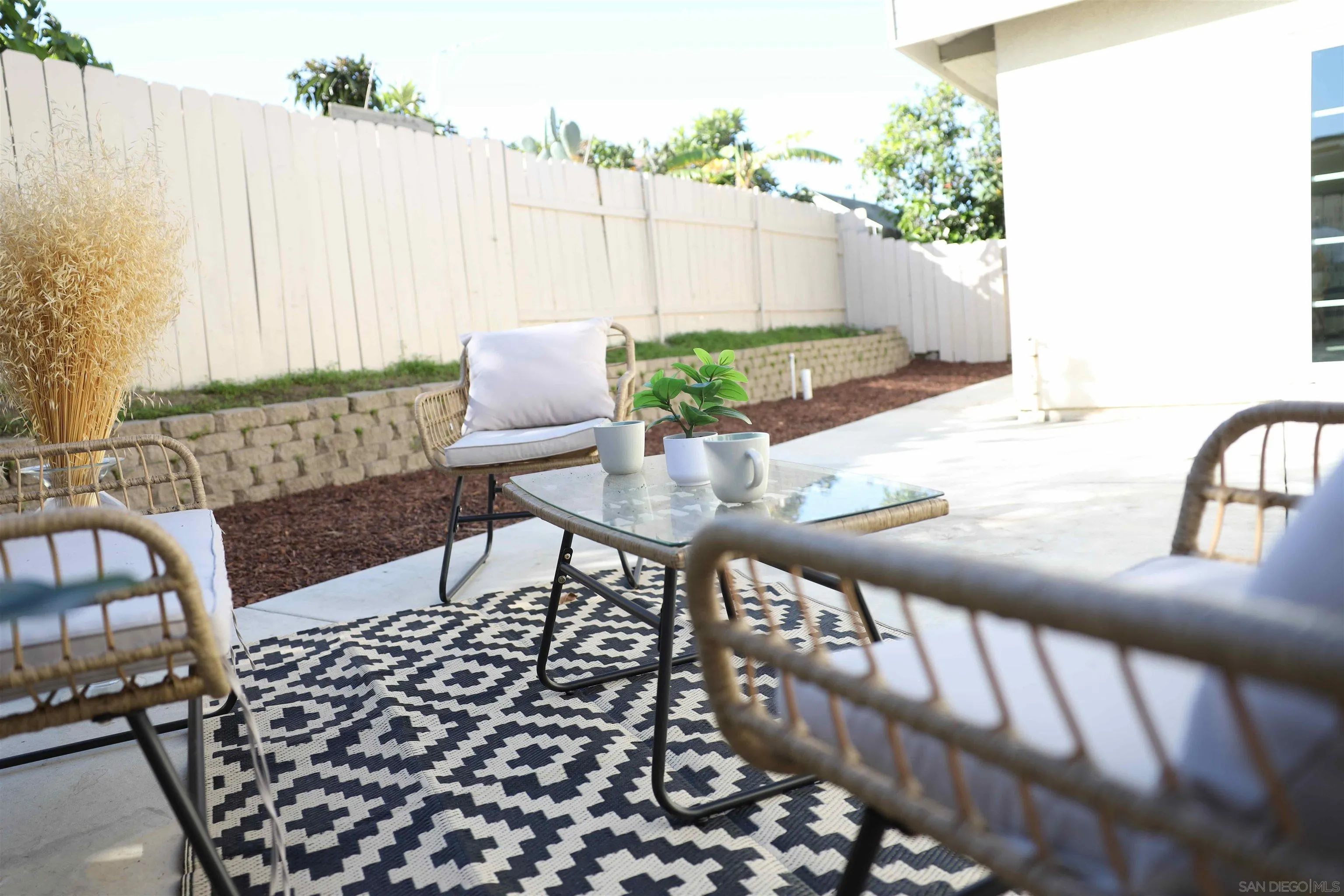 8907 Taurus Place San Diego, CA 92126 - Photo 34 of 40 a view of a chairs and table in patio