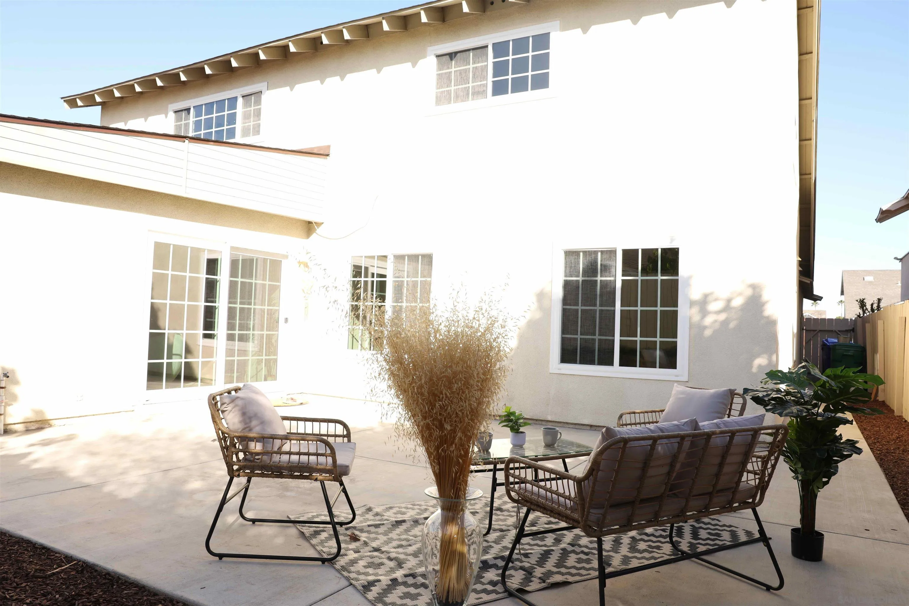 8907 Taurus Place San Diego, CA 92126 - Photo 36 of 40 a view of a house with backyard and sitting area