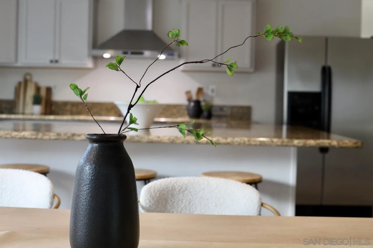 8907 Taurus Place San Diego, CA 92126 - Photo 8 of 40 a vase of flowers sitting on a table