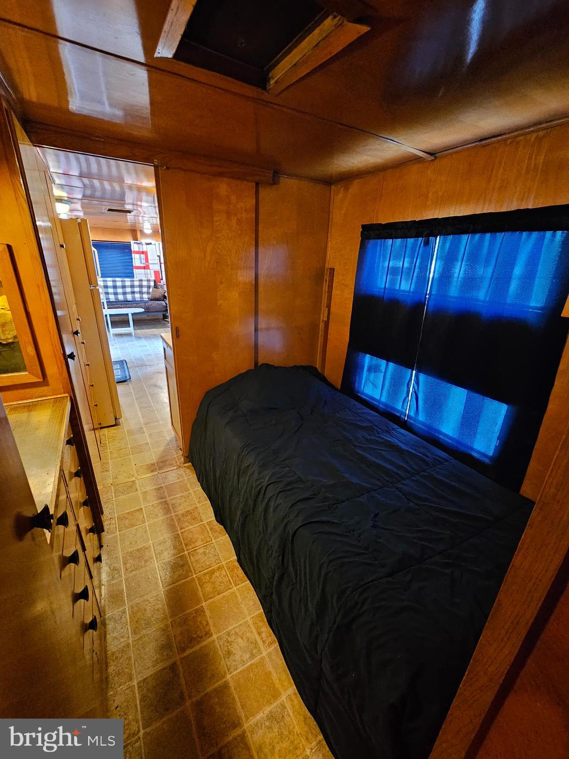3 Park Boulevard Falling Waters, WV 25419 - Photo 15 of 34 a bedroom with a bed and a window