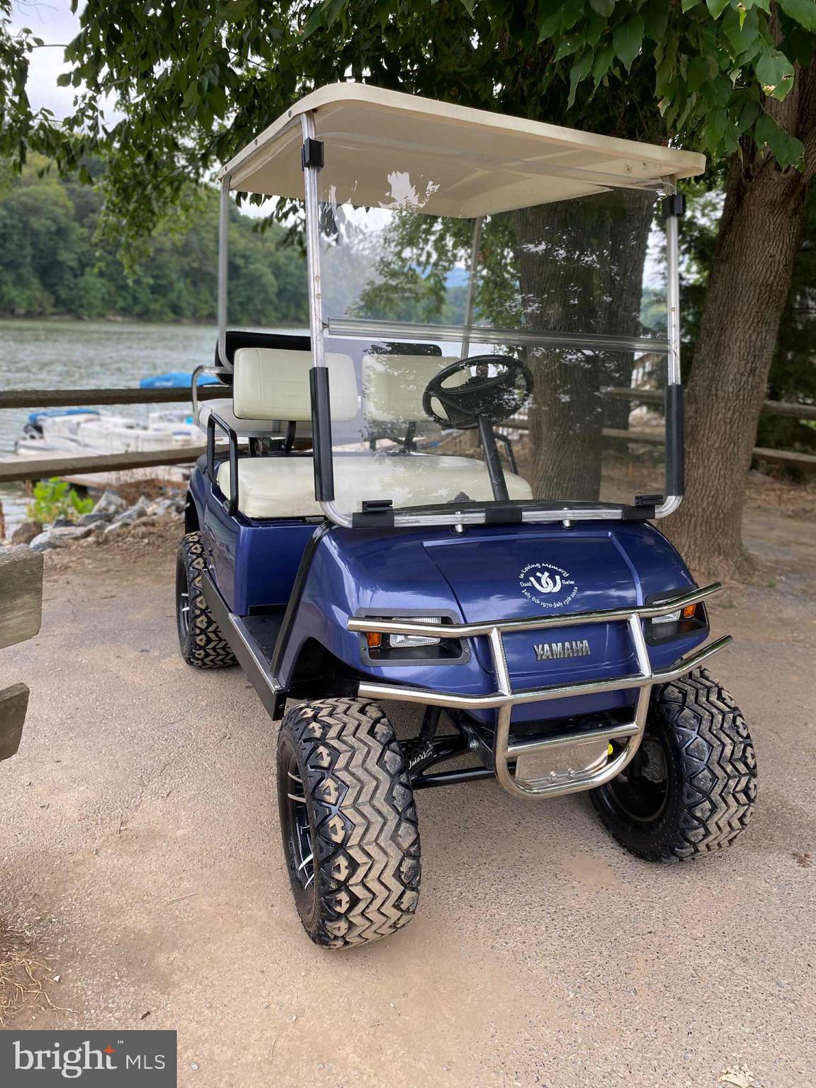 3 Park Boulevard Falling Waters, WV 25419 - Photo 22 of 34 a wooden bench sitting in front of a building