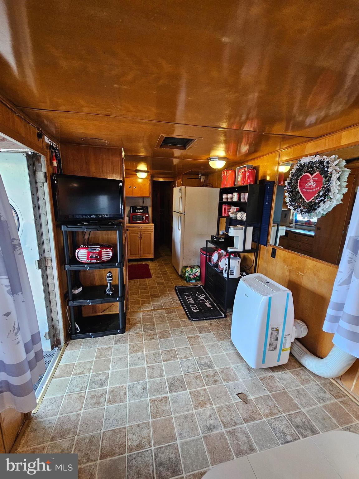 3 Park Boulevard Falling Waters, WV 25419 - Photo 10 of 34 a view of an chairs and table in a patio