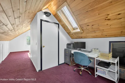 a view of a storage & utility room with furniture