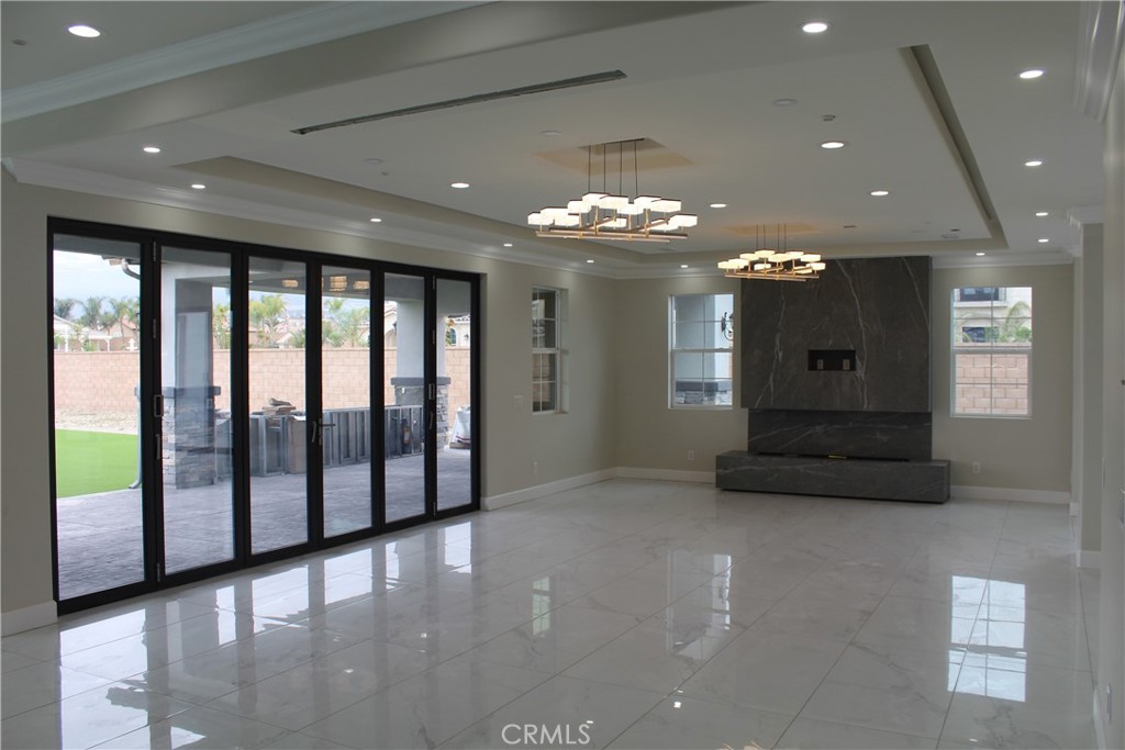 6318 Echo Mountain Rancho Cucamonga, CA 91739 - Photo 20 of 25 a view of a building stairs and a chandelier