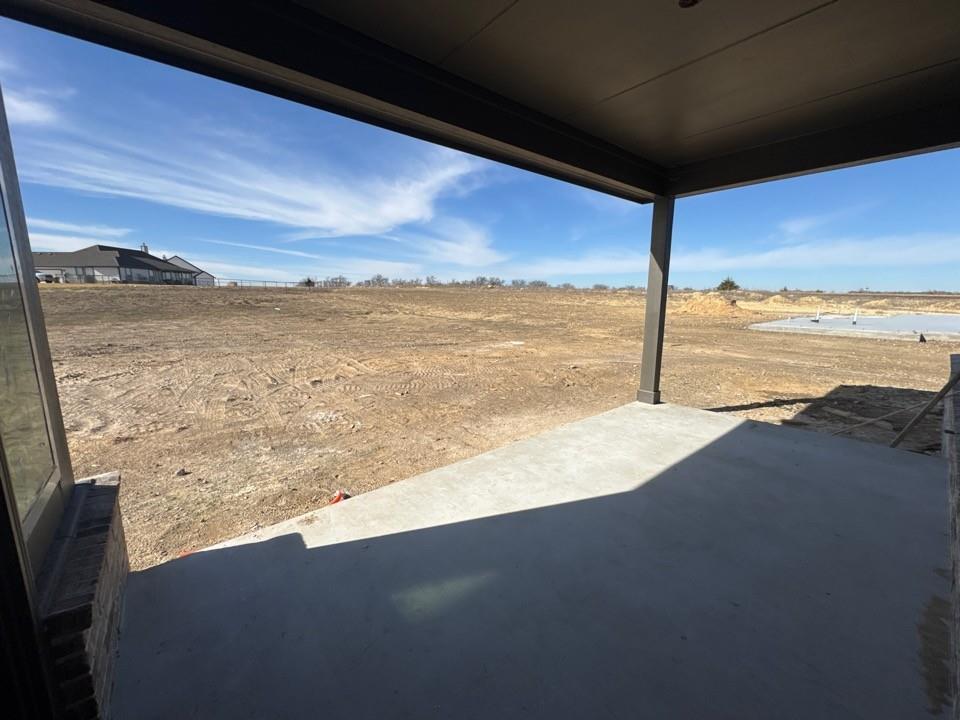 137 Moss Gln Lane Rhome, TX 76078 - Photo 11 of 12 a view of an ocean from a terrace