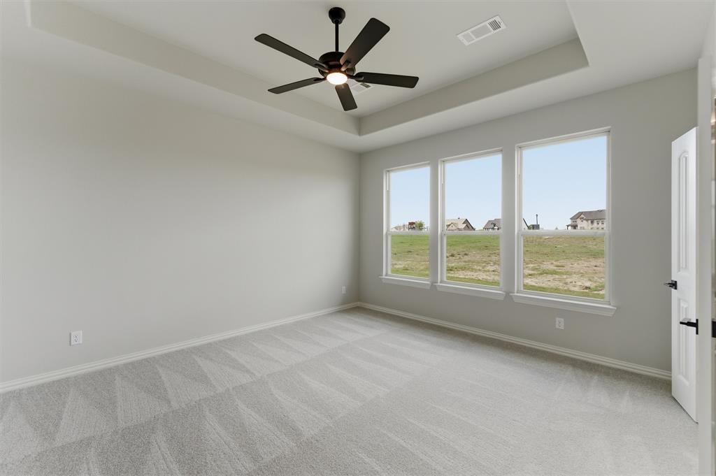 137 Moss Gln Lane Rhome, TX 76078 - Photo 14 of 25 an empty room with a window