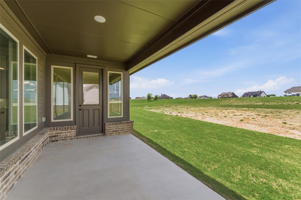 137 Moss Gln Lane Rhome, TX 76078 - Photo 21 of 25 a view of an outdoor space and balcony