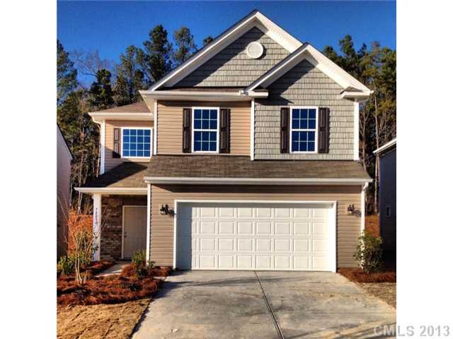 78090 Rillstone Drive, Unit 200 Lancaster, SC 29720 - Photo 1 of 6 a front view of a house with a yard