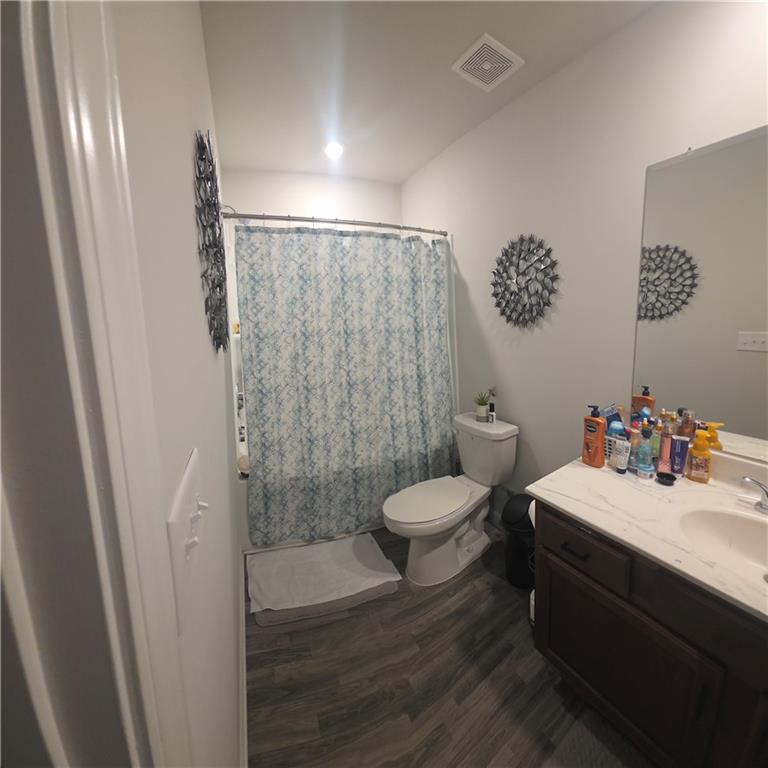 4768 Rdg Vly Drive Gainesville, GA 30504 - Photo 2 of 23 a bathroom with a sink and a toilet