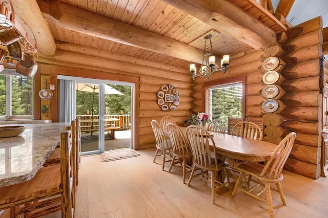 a view of a porch with wooden floor