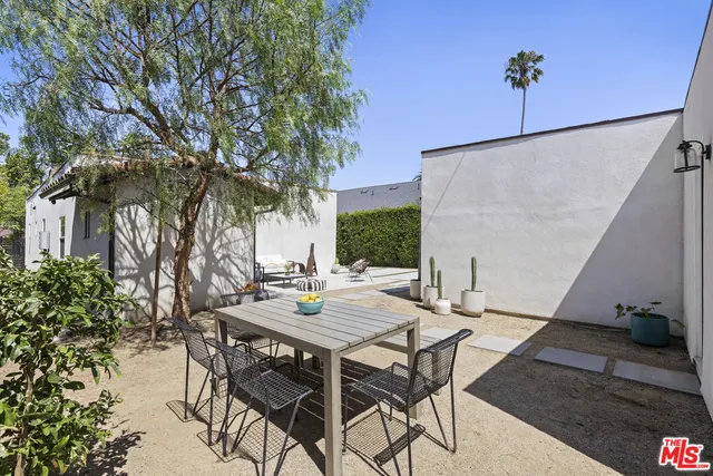 a view of an outdoor space with furniture