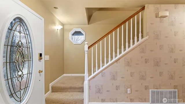 a view of entryway with wooden floor