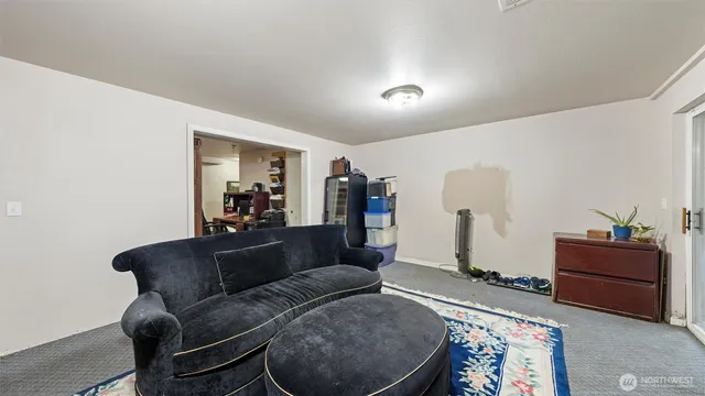 a living room with furniture and a couch