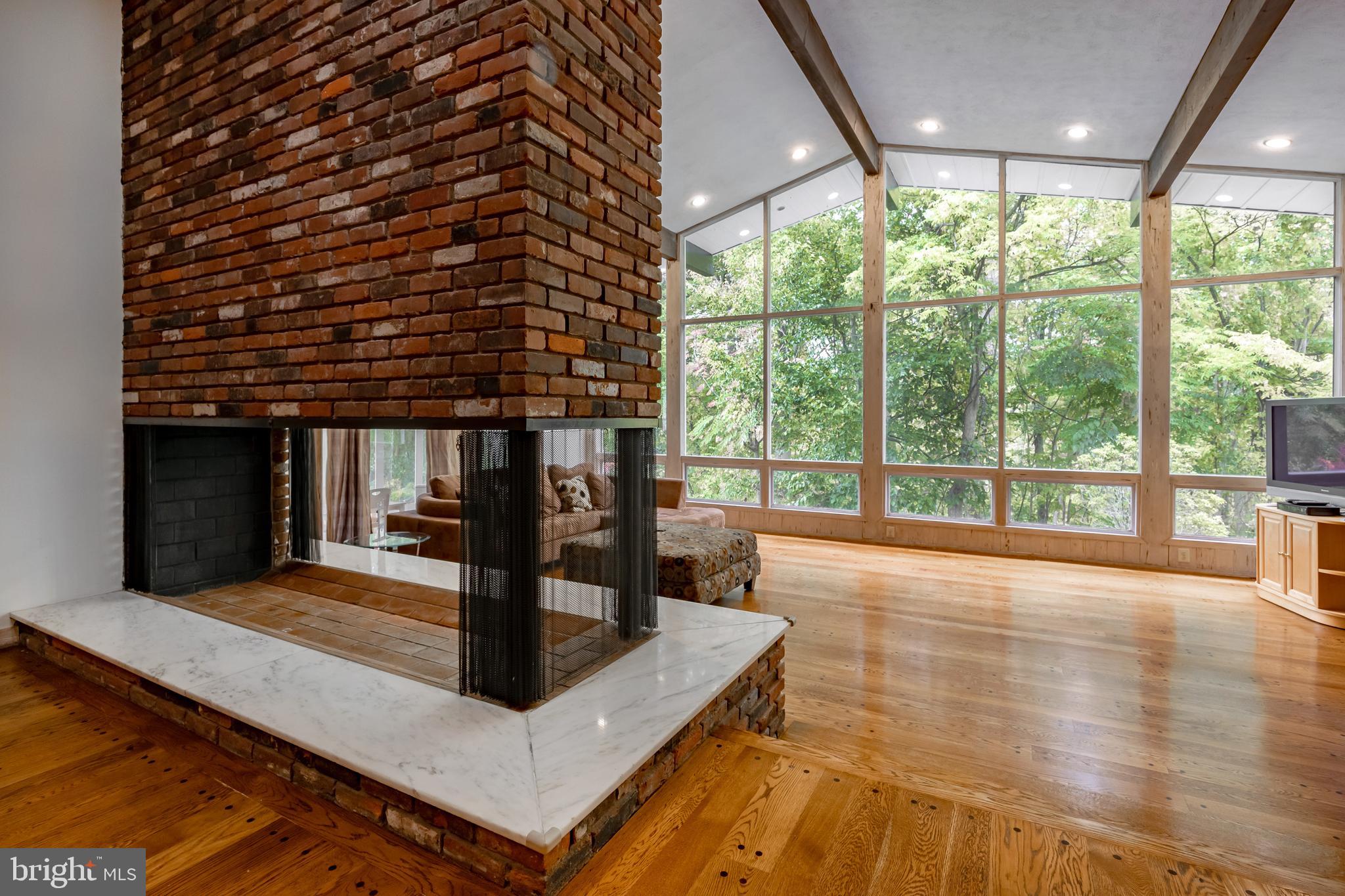 43 Fairview Road Penn Valley, PA 19072 - Photo 16 of 51 Brick Double Sided Fireplace