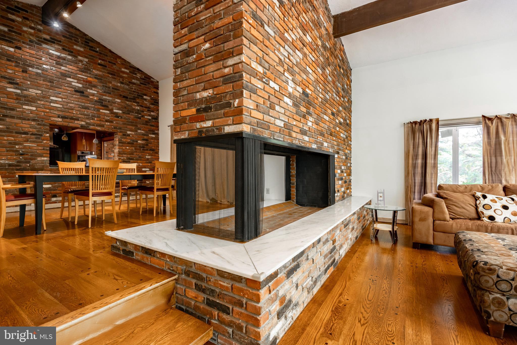 43 Fairview Road Penn Valley, PA 19072 - Photo 19 of 51 Doublesided Fireplace with D/R and Great Room