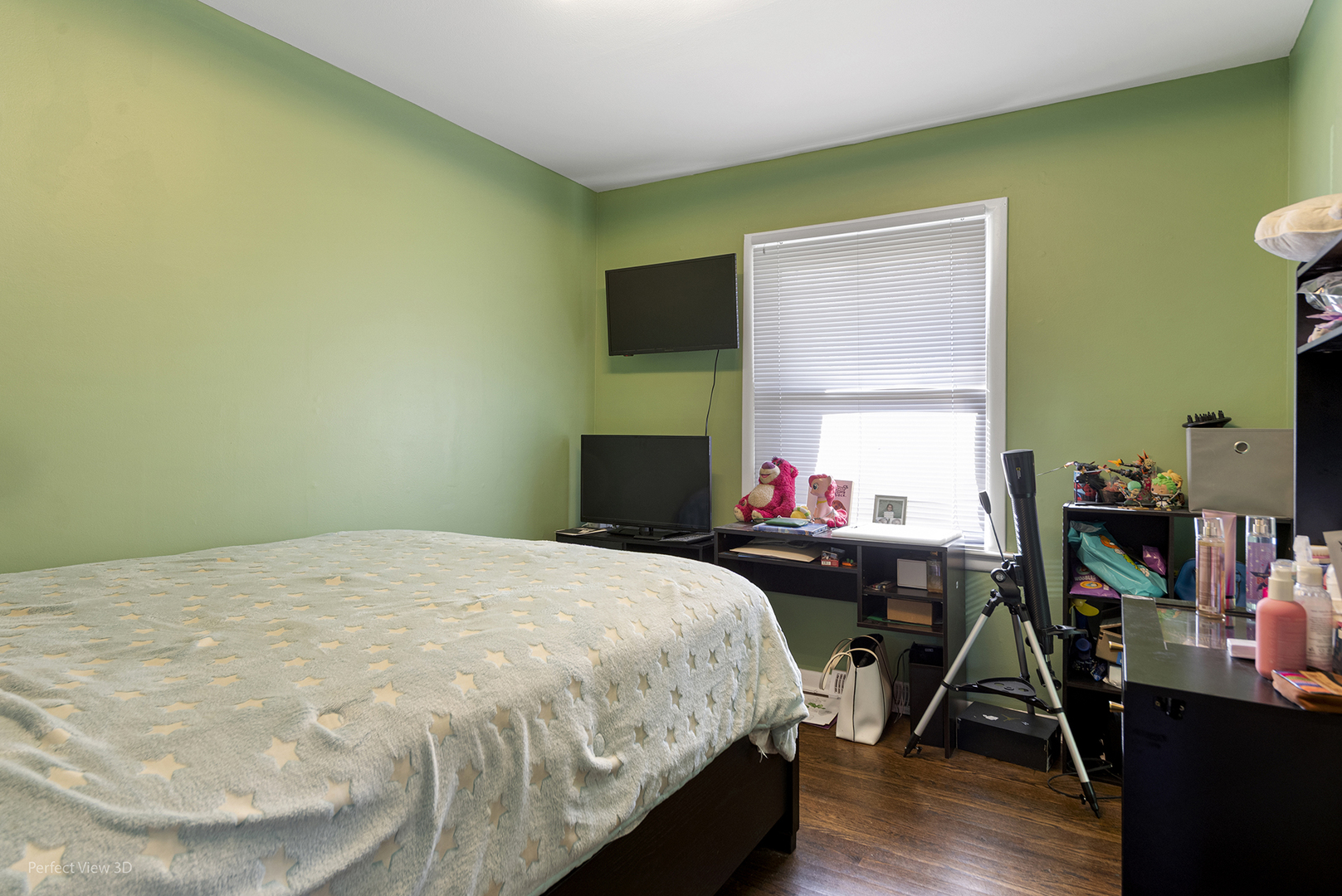 9007 Ridgeland Avenue Oak Lawn, IL 60453 - Photo 11 of 22 a bedroom with a bed and a wooden floor
