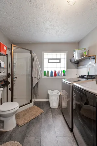 a kitchen with a sink and a stove top oven