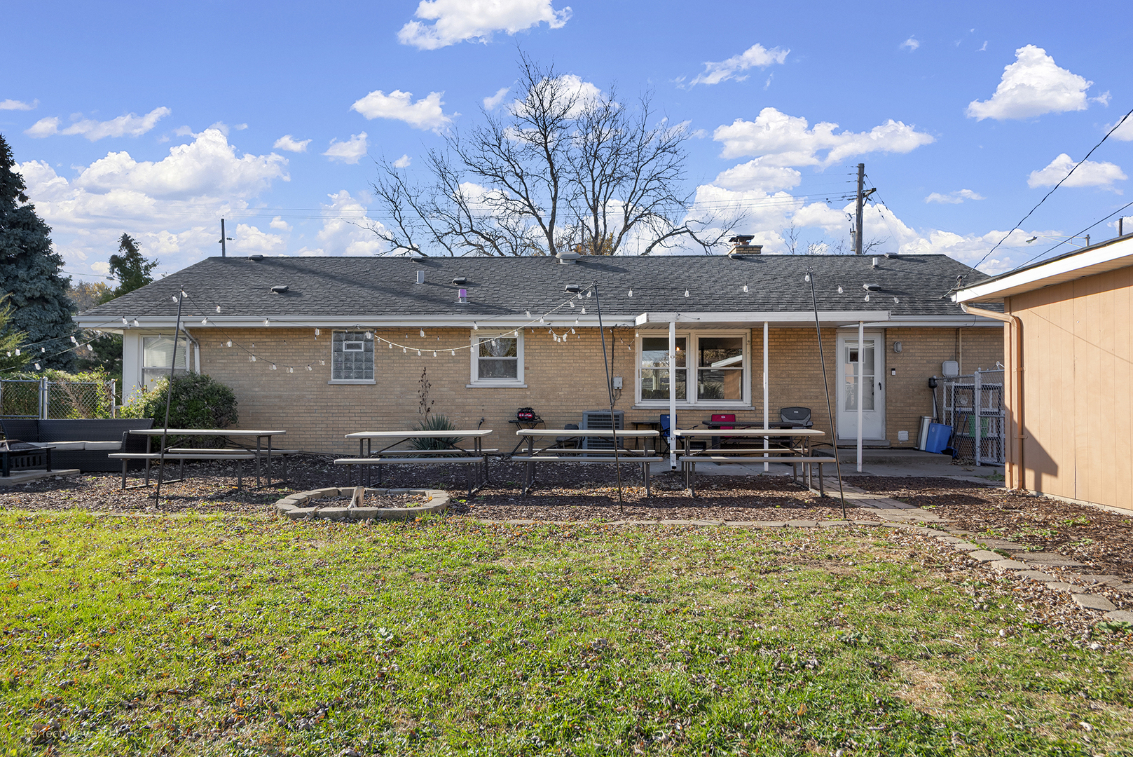 9007 Ridgeland Avenue Oak Lawn, IL 60453 - Photo 22 of 22 a view of a house with backyard and sitting area