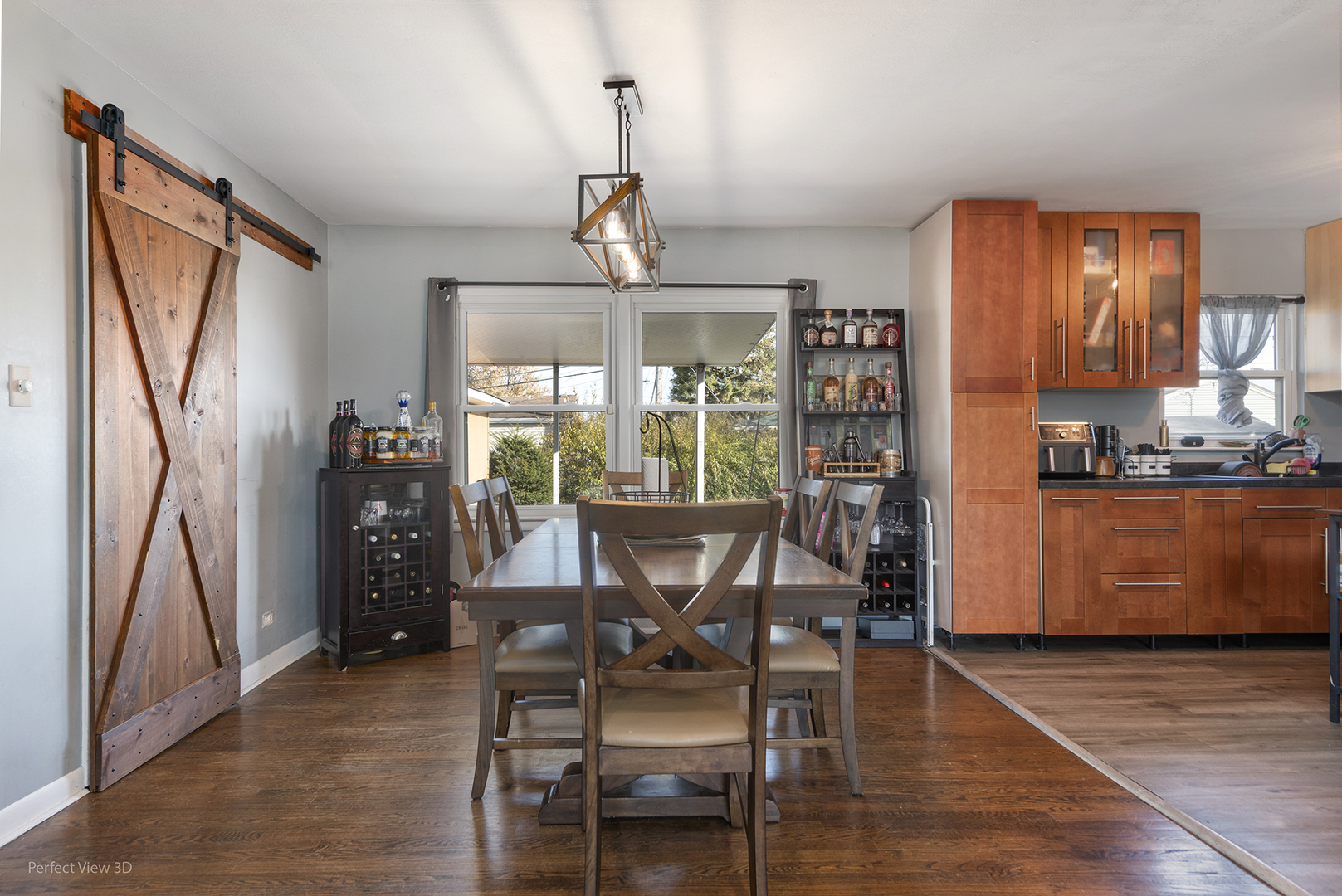 9007 Ridgeland Avenue Oak Lawn, IL 60453 - Photo 5 of 22 a view of a dining room with furniture window and wooden floor