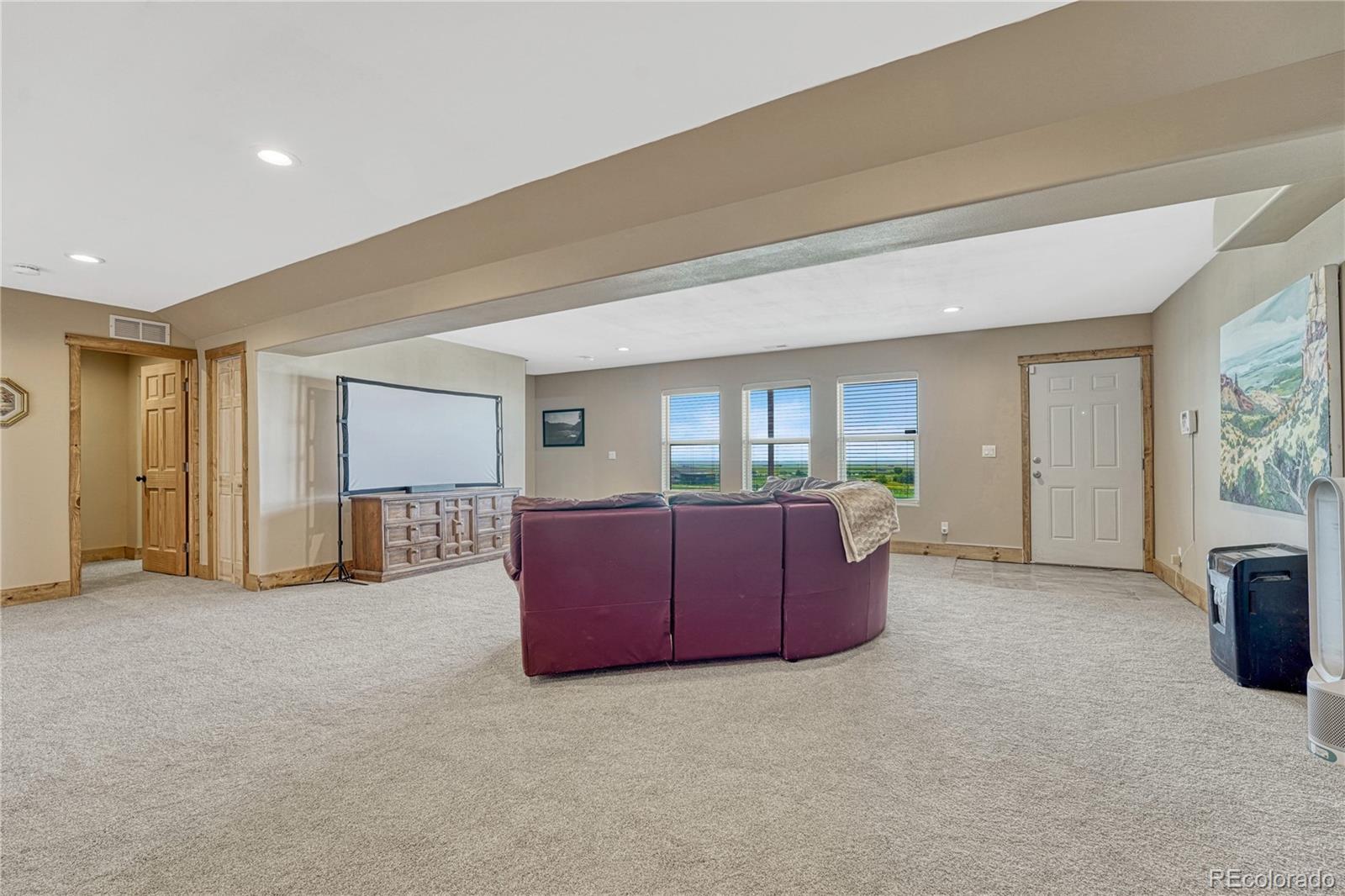 17355 Wagon Train Loop Peyton, CO 80831 - Photo 29 of 48 a living room with furniture