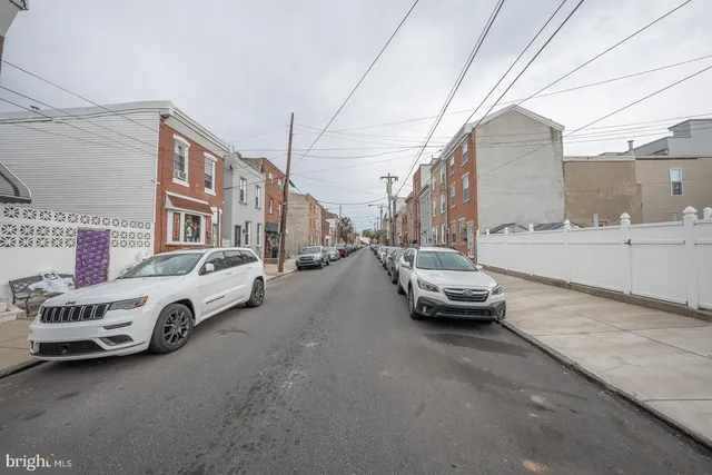 a car parked in front of a house