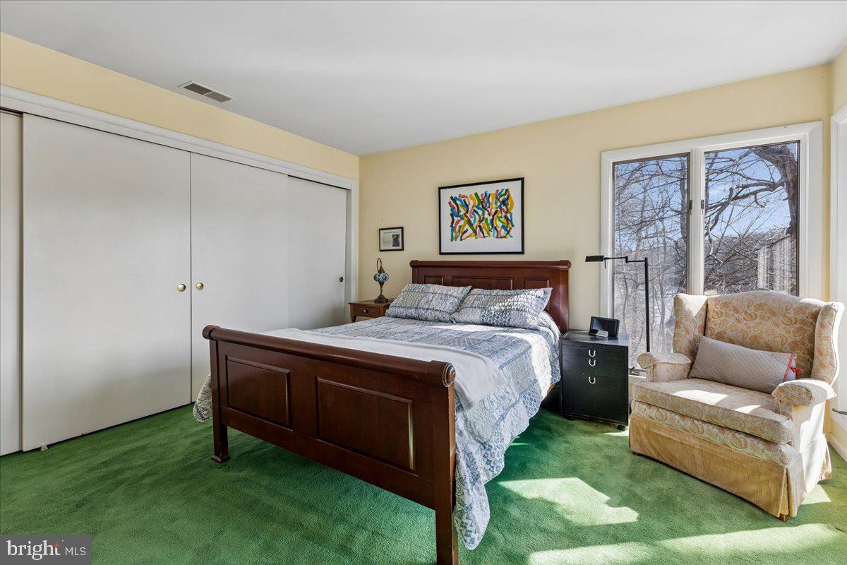 10087 John Carvill Road Chestertown, MD 21620 - Photo 23 of 63 a bedroom with a bed and a couch