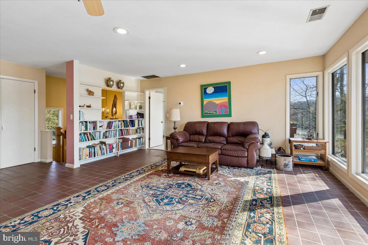 10087 John Carvill Road Chestertown, MD 21620 - Photo 6 of 63 a living room with furniture and a rug