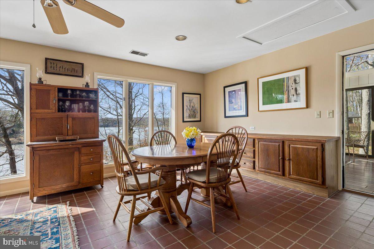 10087 John Carvill Road Chestertown, MD 21620 - Photo 10 of 63 a dining room with furniture and window