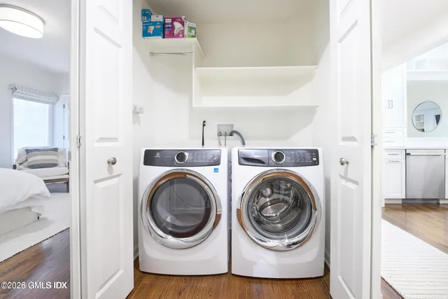 a utility room with dryer and washer