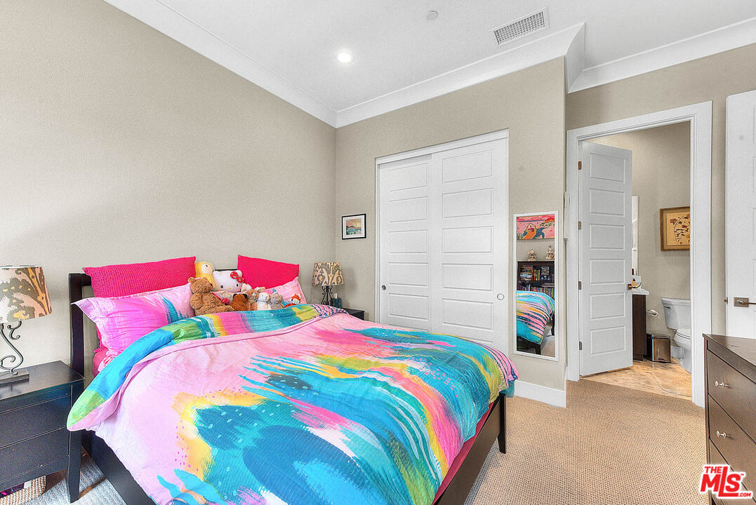 20558 Overlook Court Porter Ranch, CA 91326 - Photo 32 of 48 a bedroom with a bed and closet