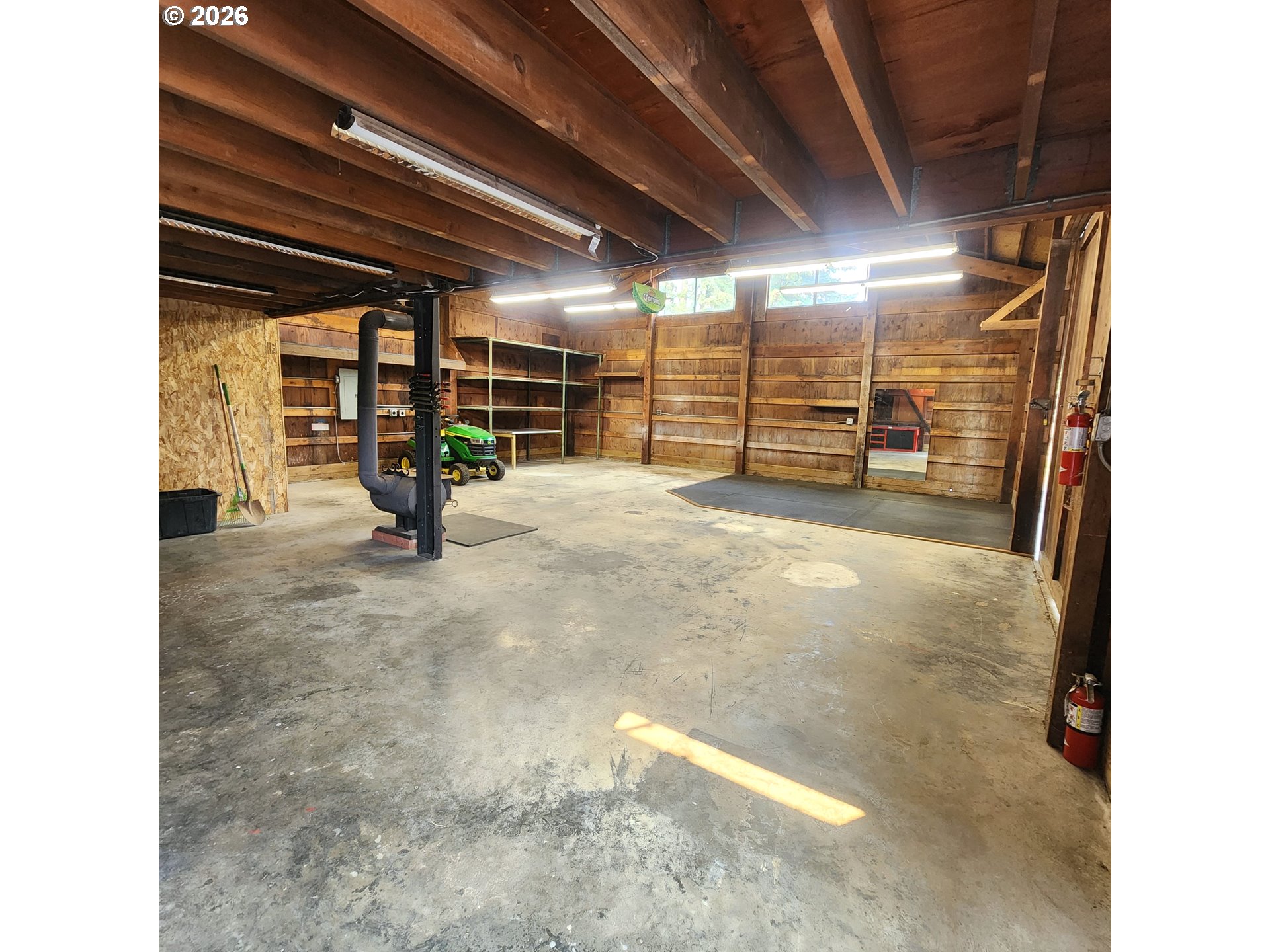 54047 West Lane Road Scappoose, OR 97056 - Photo 20 of 44 a view of an empty room with a sliding door