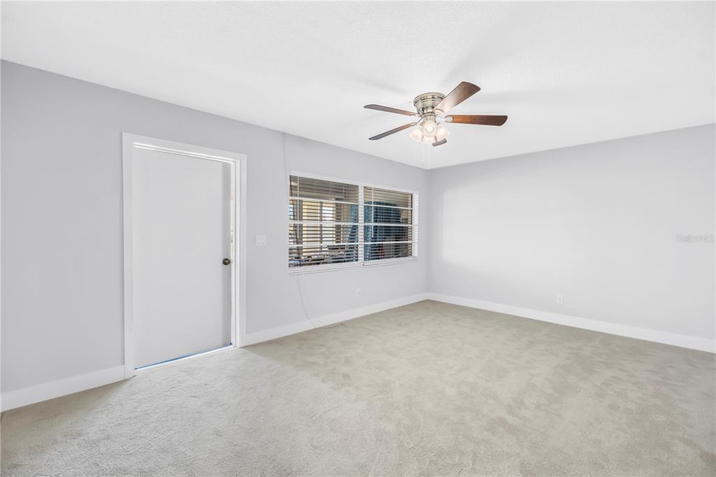 4700 Cove Circle, Unit 103 St. Petersburg, FL 33708 - Photo 16 of 31 a view of an empty room with a window