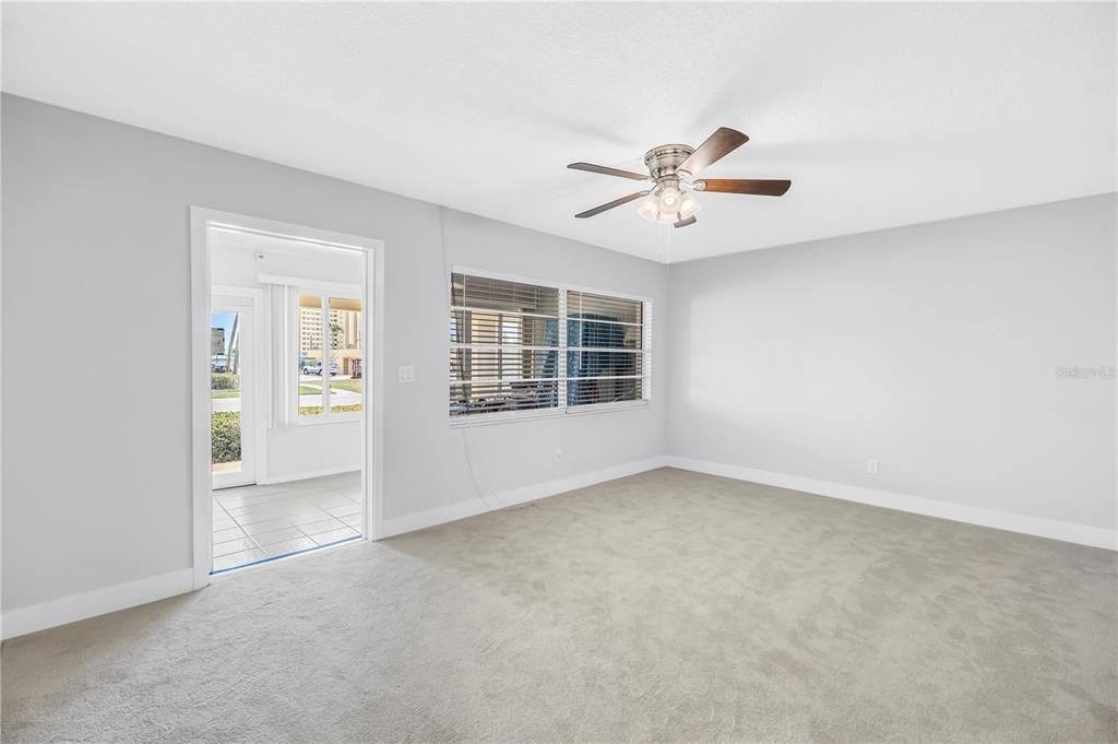 4700 Cove Circle, Unit 103 St. Petersburg, FL 33708 - Photo 17 of 31 a view of an empty room with a window