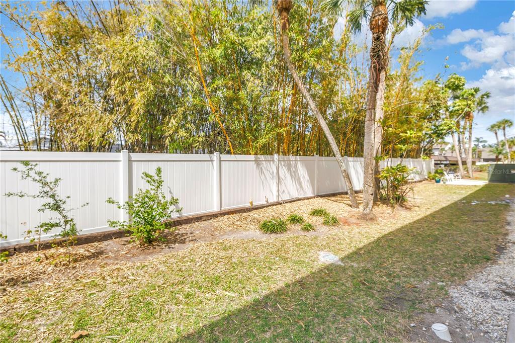 4700 Cove Circle, Unit 103 St. Petersburg, FL 33708 - Photo 30 of 31 a view of a backyard