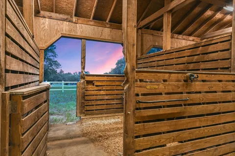 a view of a wrought iron fences in front of house