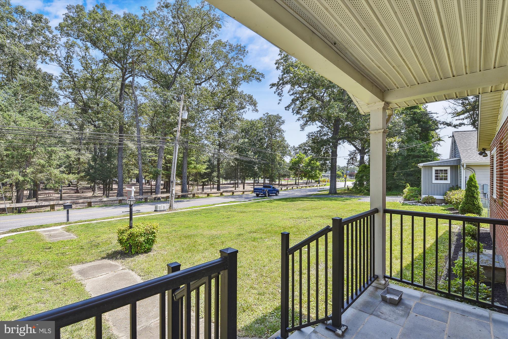 Covered porch greets guests