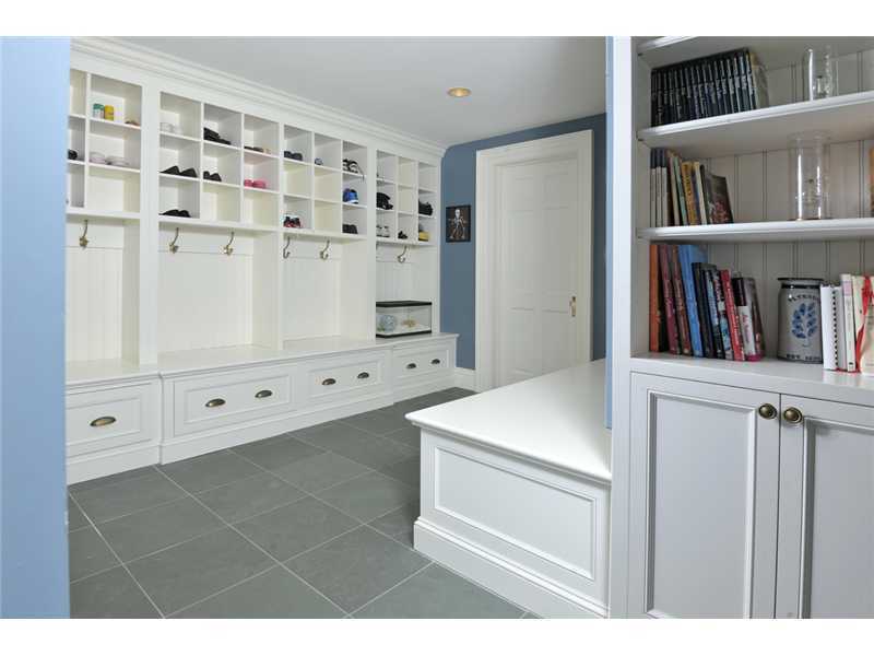 78 Doubling Road Greenwich, CT 06830 - Photo 12 of 20 a kitchen with white cabinets and window