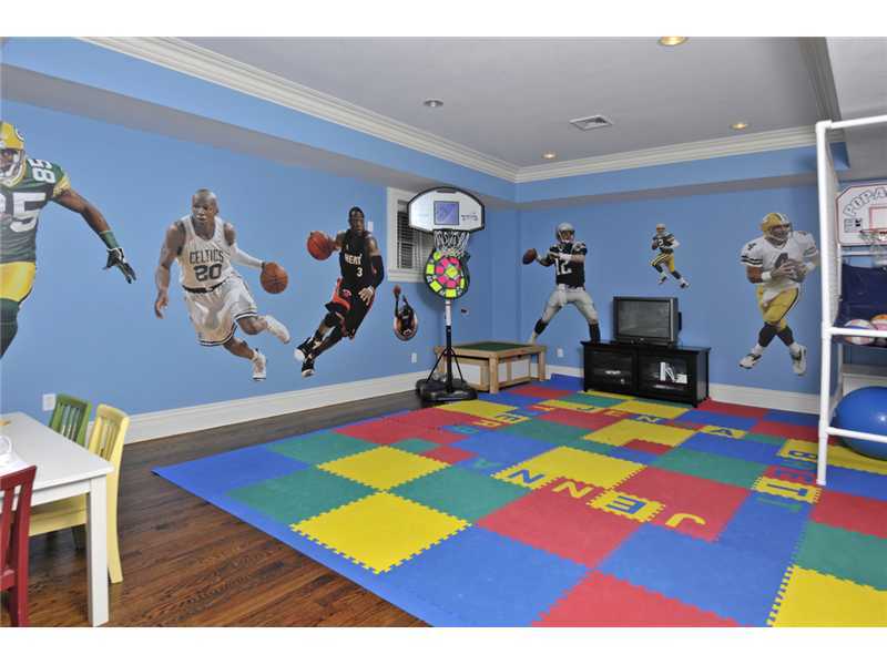 78 Doubling Road Greenwich, CT 06830 - Photo 15 of 20 a room with musical instruments and paintings on the wall