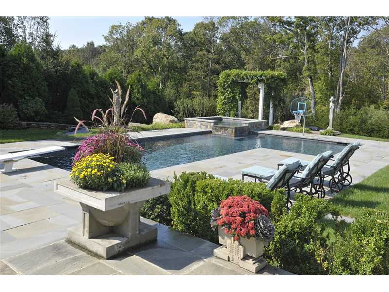 78 Doubling Road Greenwich, CT 06830 - Photo 17 of 20 a view of a fountain with potted plants