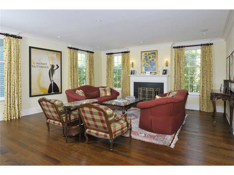 78 Doubling Road Greenwich, CT 06830 - Photo 6 of 20 a living room with furniture wooden floor and a fireplace