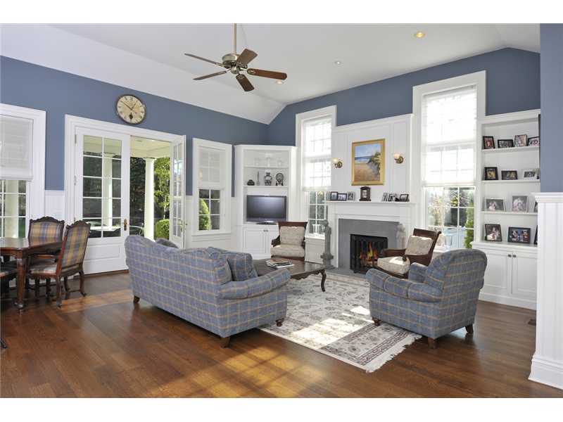 78 Doubling Road Greenwich, CT 06830 - Photo 9 of 20 a living room with furniture a fireplace and a large window