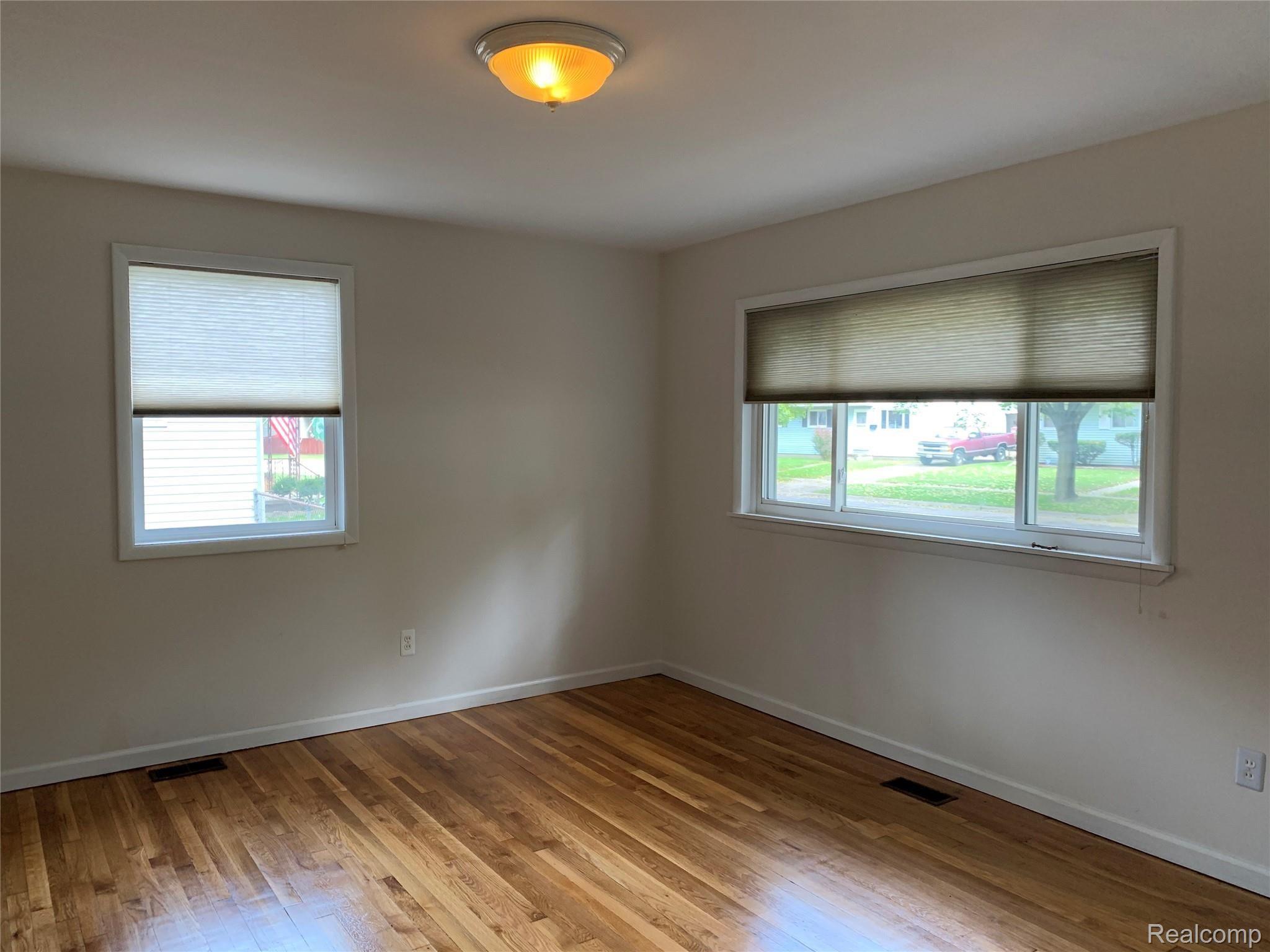 1365 Rambling Road Ypsilanti, MI 48198 - Photo 5 of 23 1365 Rambling- Living Room 4.jpg