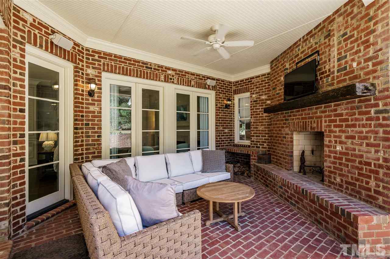 1530 Brooks Avenue Raleigh, NC 27607 - Photo 29 of 30 Outdoor wood burning fireplace with TV mounting above! Awesome spot to watch football!
