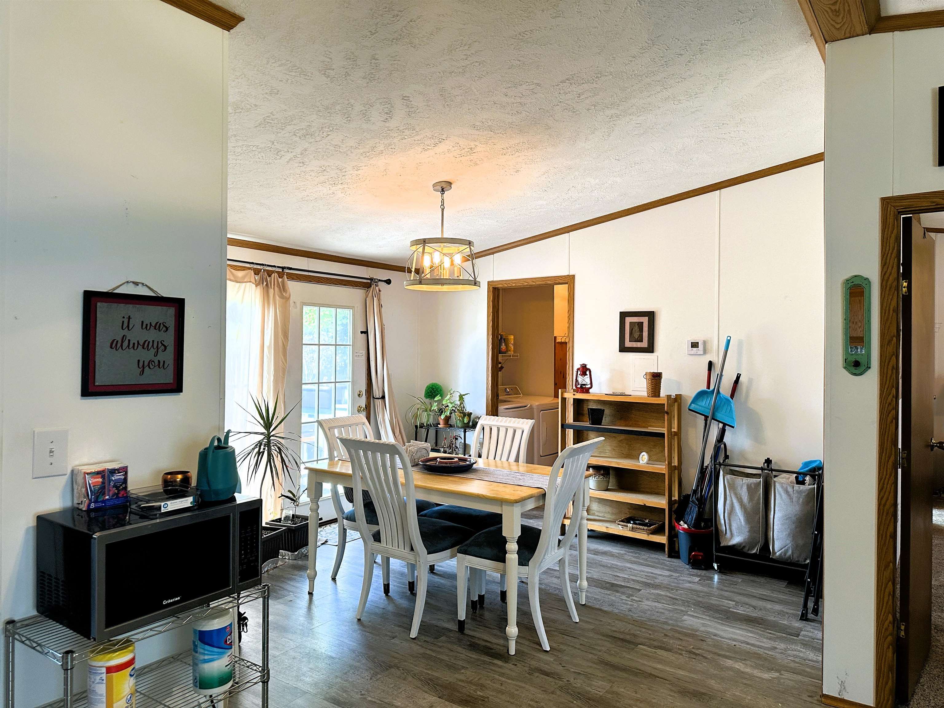 291 Highway 2 Dixon, IL 61021 - Photo 12 of 27 a view of a dining room with furniture and wooden floor