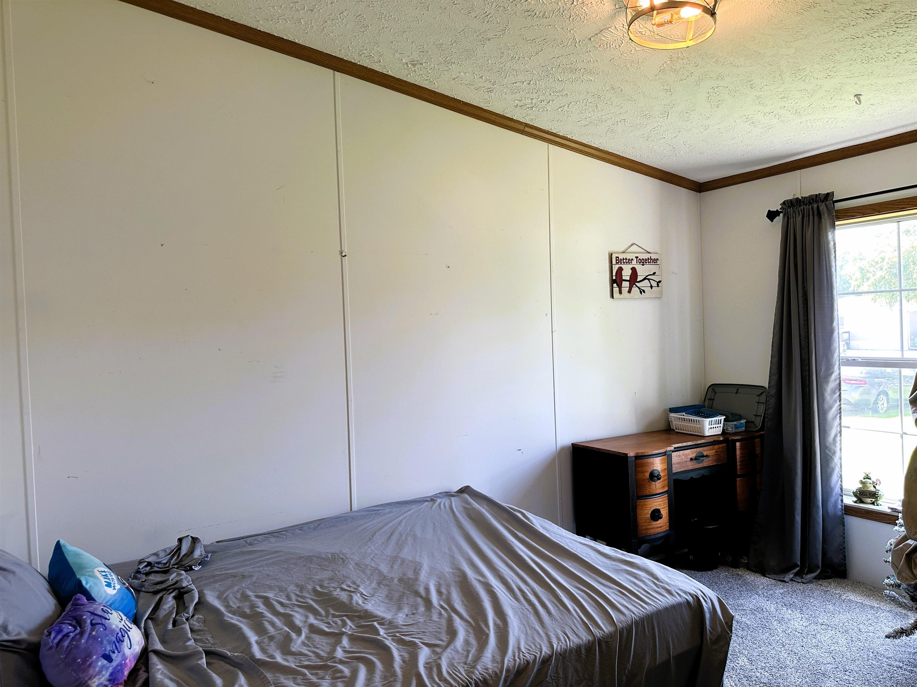 291 Highway 2 Dixon, IL 61021 - Photo 22 of 27 a bedroom with a bed and a closet
