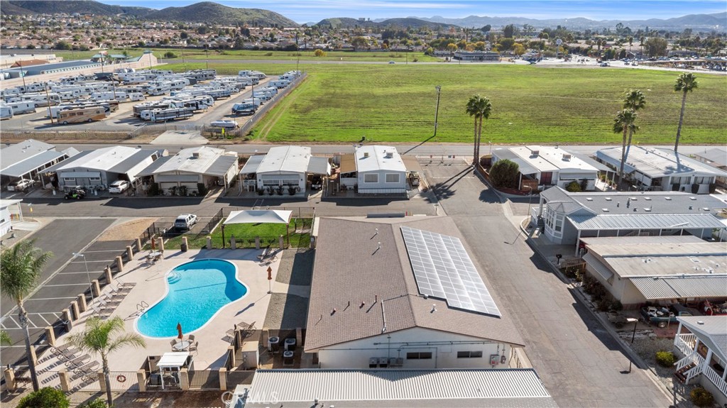 27150 Shadel Road, Unit 122 Menifee, CA 92586 - Photo 21 of 26 an aerial view of a house with a lake view