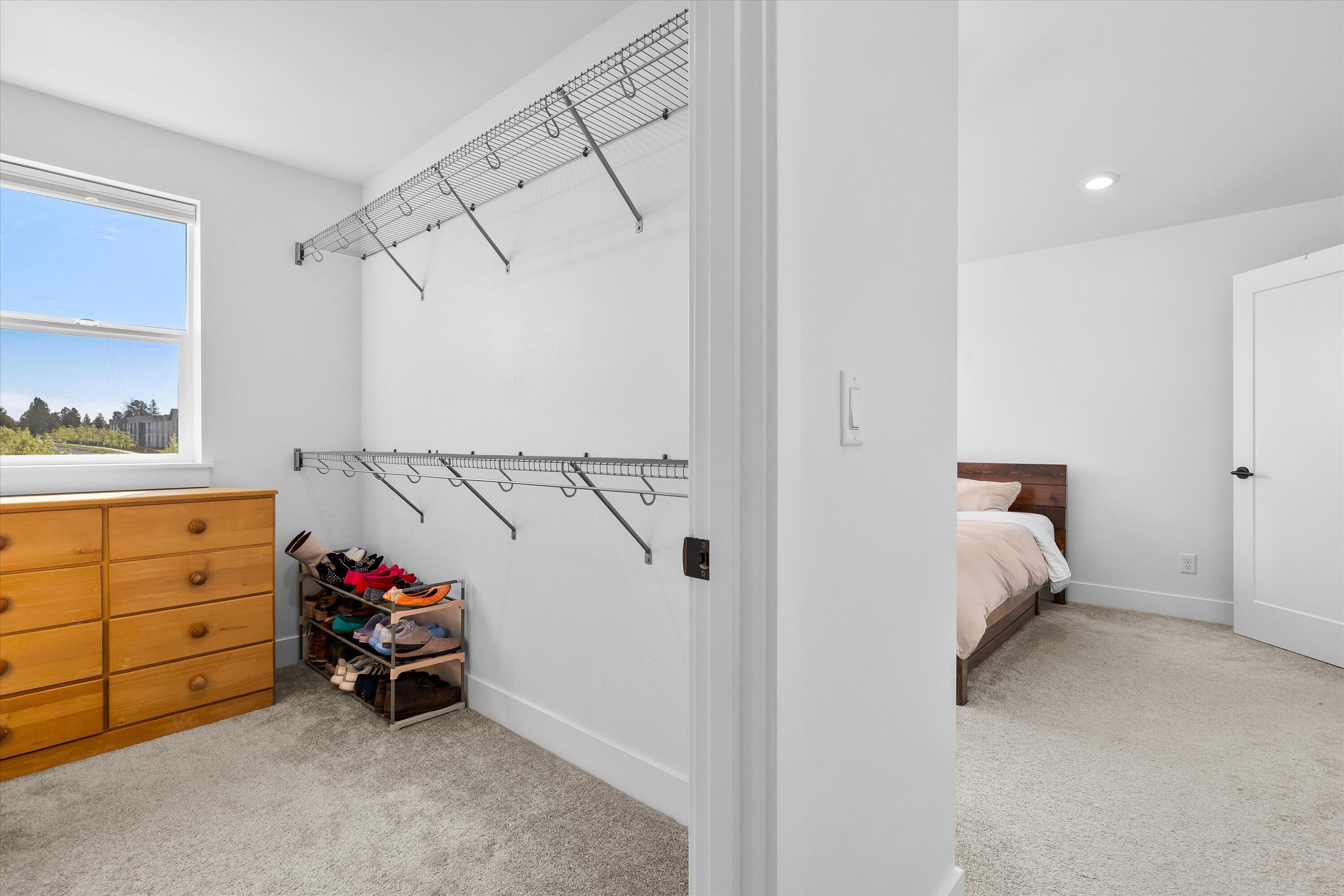 60903 Southeast Epic Place Bend, OR 97702 - Photo 25 of 48 a bed room with a bed and a window