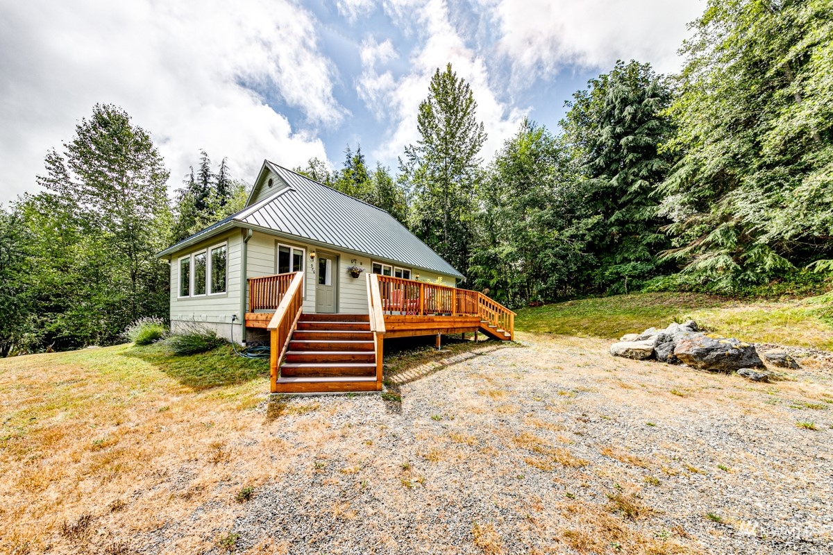 976 Township Line Road Port Angeles, WA 98362 - Photo 3 of 40 a view of a house with a yard