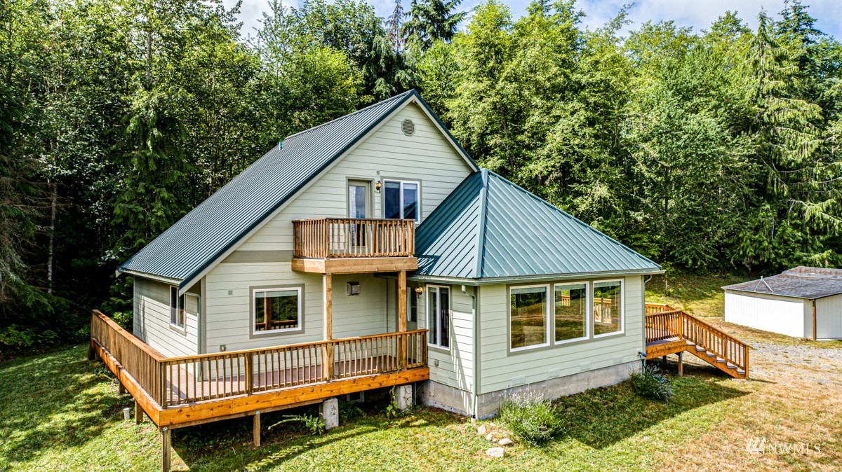976 Township Line Road Port Angeles, WA 98362 - Photo 35 of 40 an aerial view of a house with a yard
